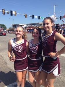 My dot's first outing as a pom girl for the high school. She loved being on the float and a little girl stopped by to say hi to them. Cutest thing ever.
