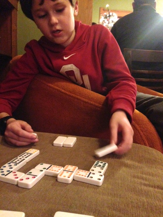 Taking time out for dominoes at Cuppies and Joe with my youngest. "be present"